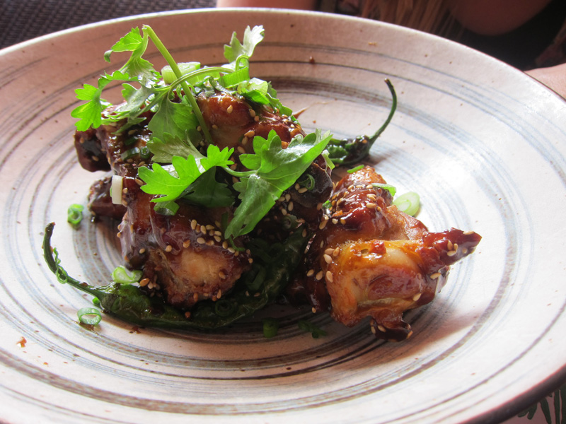 Crispy, tangy chicken wings at Cheu Noodle Bar